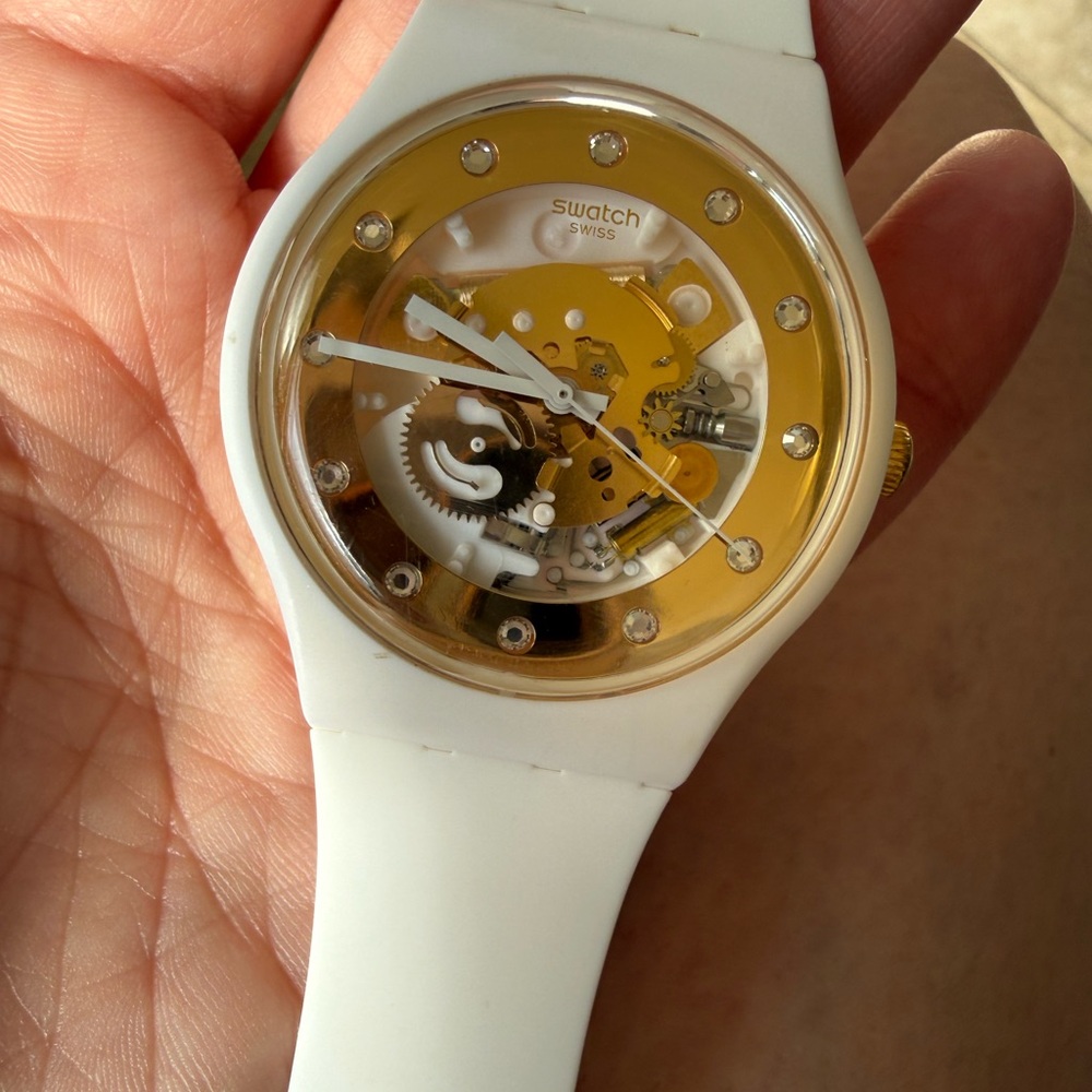 Swatch Gold and White Skeleton Smartwatch
